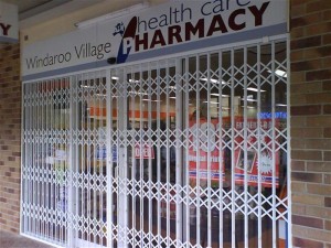 Trellidor-Retractable-Security-Trellis-Windaroo-Pharmacy-closed